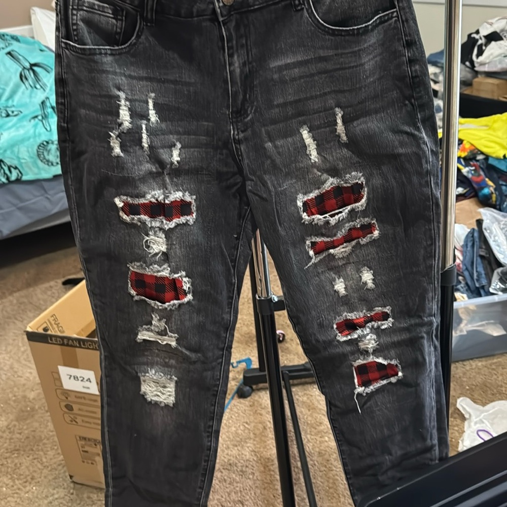 Brand new women’s size 12 black ripped jeans party ready